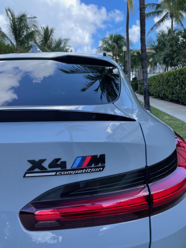BMW X4M Competition delivered to luxury Palm Beach home via enclosed car shipping service