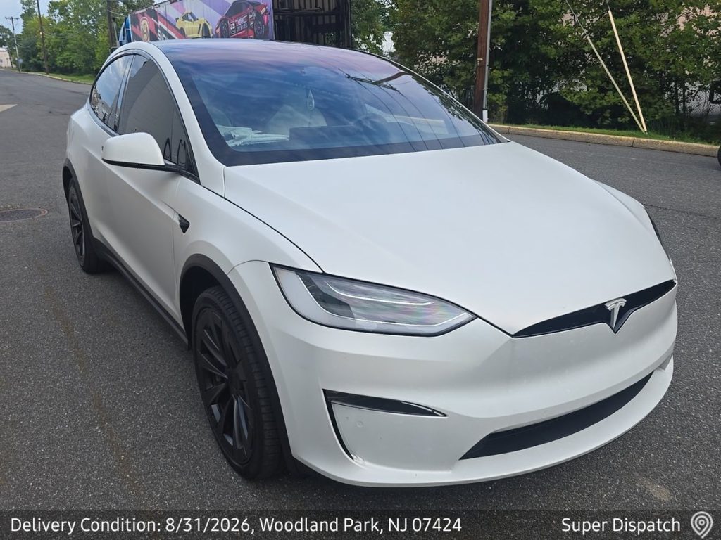 White Tesla Model X after expedited enclosed delivery in New Jersey
